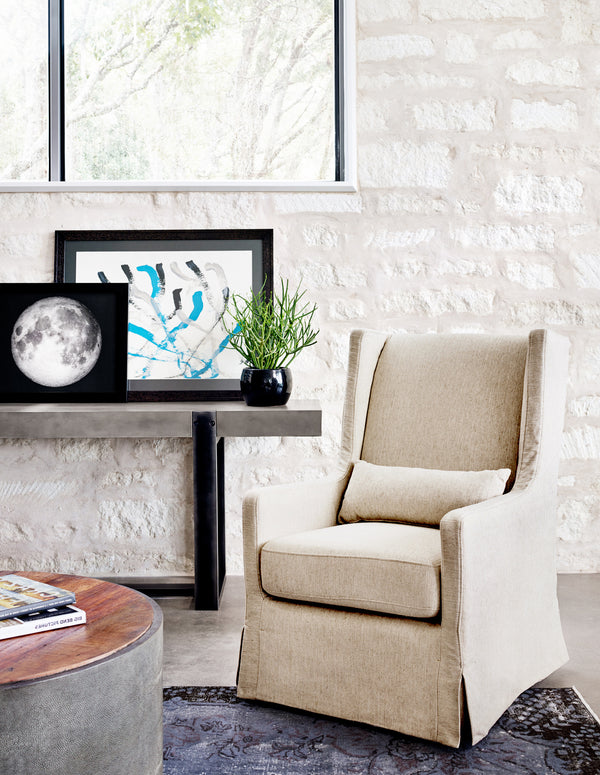 Four Hands Swivel Wing Chair