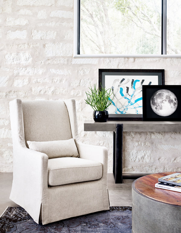 Four Hands Swivel Wing Chair