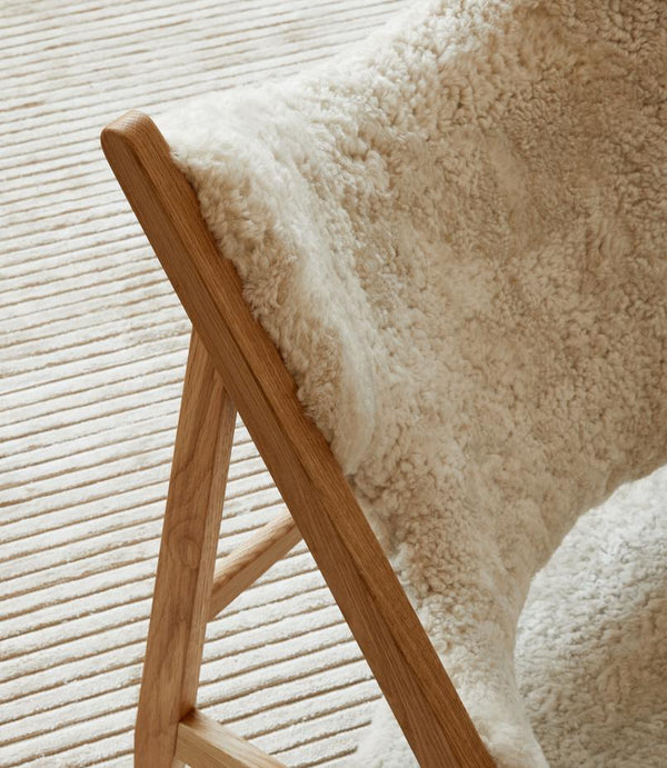 Menu Knitting Chair Walnut Base / Sahara Skeepskin 