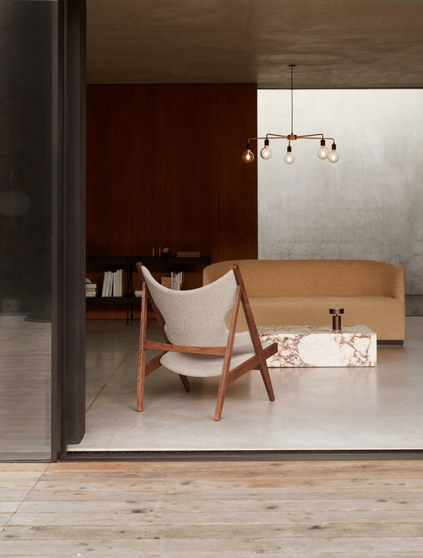 Menu Knitting Chair Walnut Base / Sahara Skeepskin 