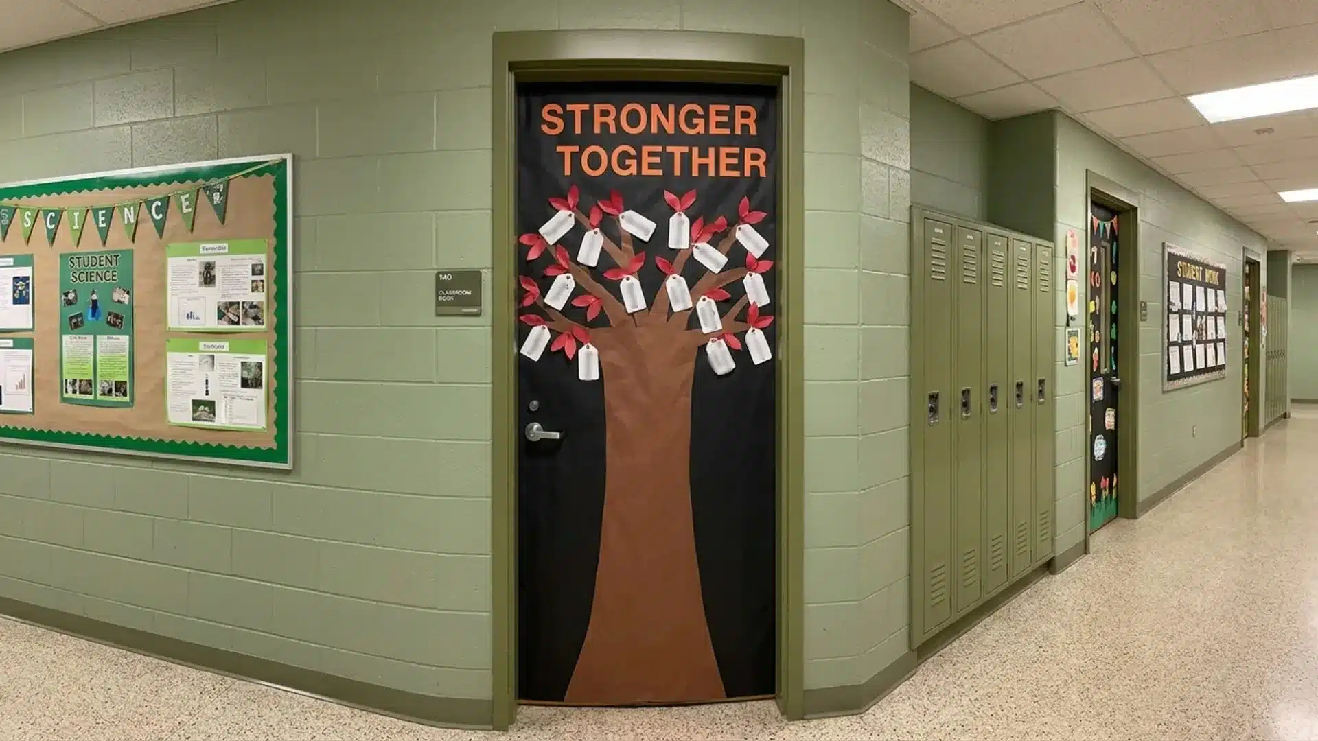 a corridor showcasing a door embellished with a tree motif, enhancing the aesthetic appeal of the space