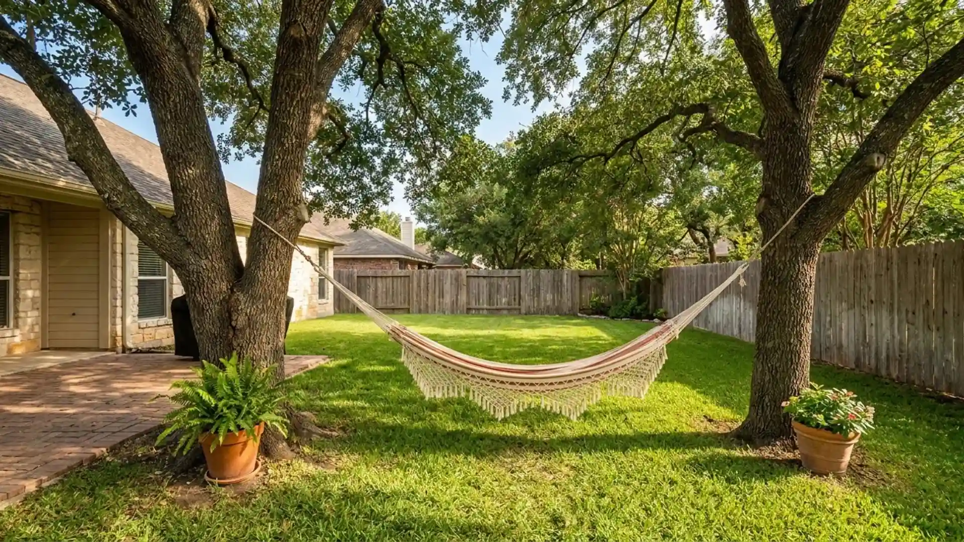backyard scene featuring a swing set and a potted plant, creating a serene outdoor atmosphere.