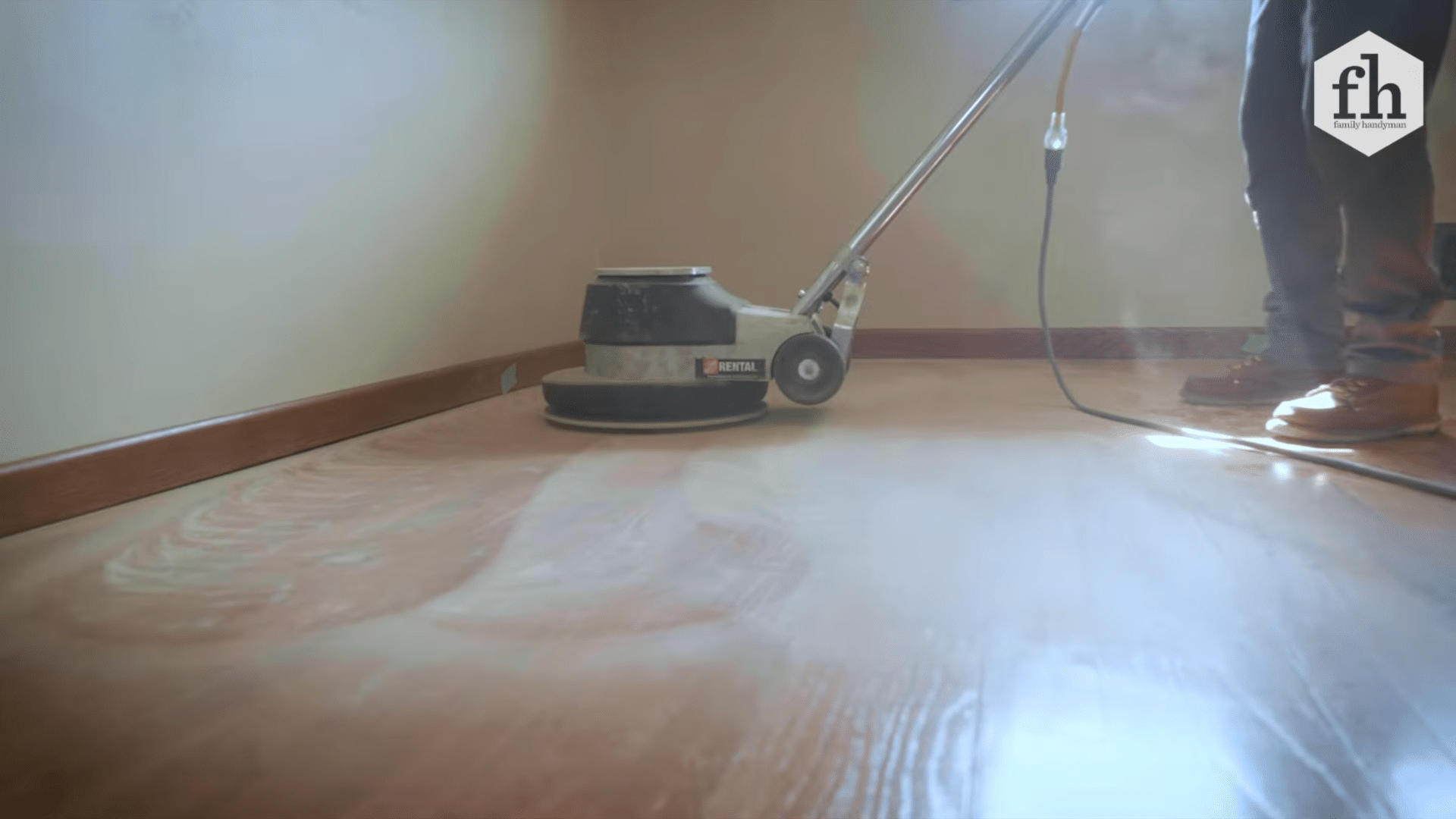 floor maintainer machine scuffing hardwood floor surface before refinishing