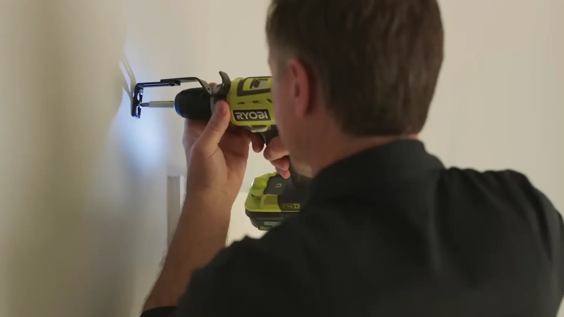 driving screw into curtain rod bracket with ryobi drill close to wall