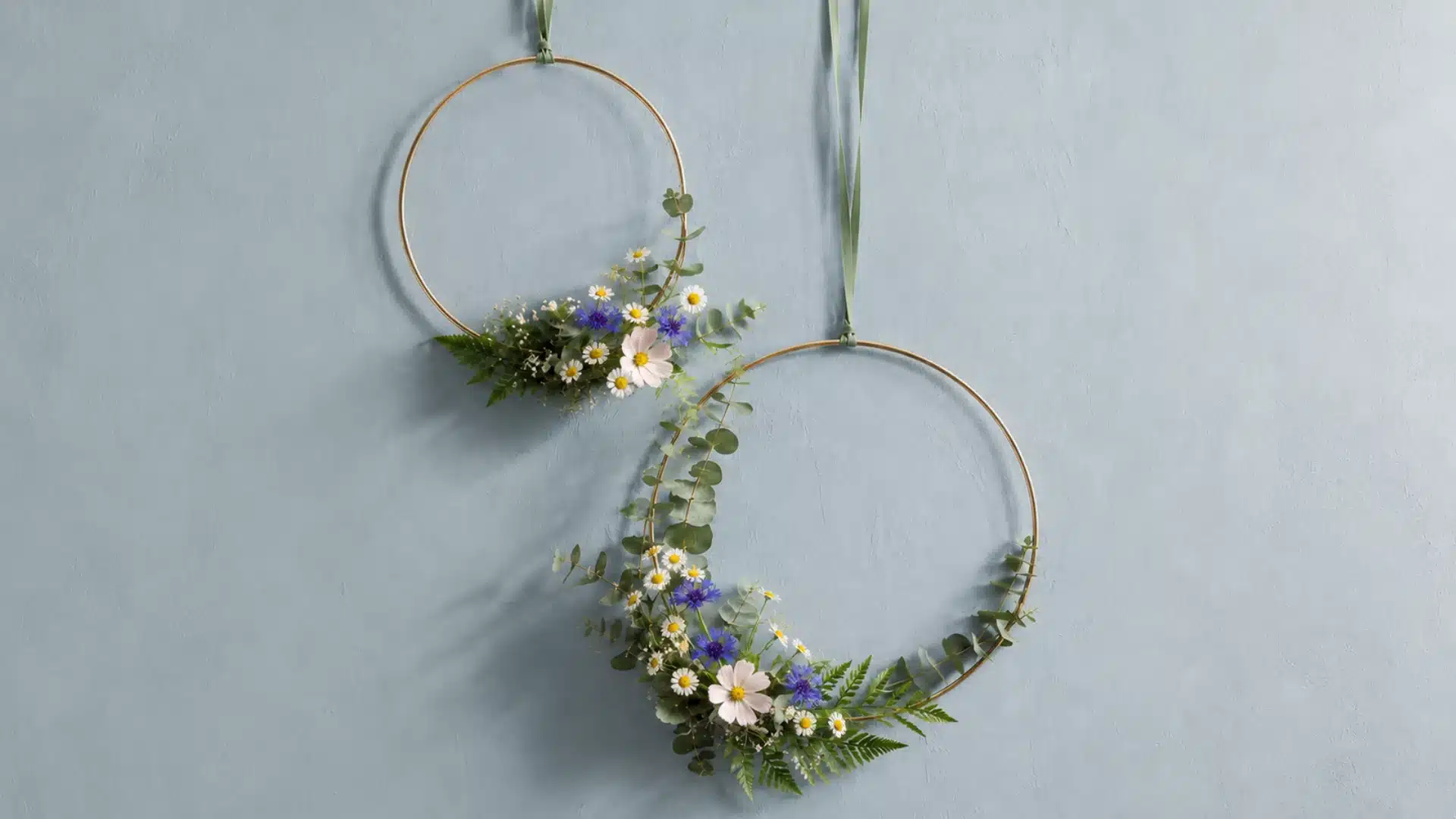 minimalist wildflower hoop wreaths with an asymmetrical floral cluster